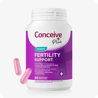For Conceive Plus Couples Bundle Fertility Support | His/Her Deal (FR), image of women's fertility support supplement bottle shown with a purple label and two pink capsules beside it, featuring dual-language French and Dutch text promoting female fertility health with folic acid and essential nutrients, presented on a white background.