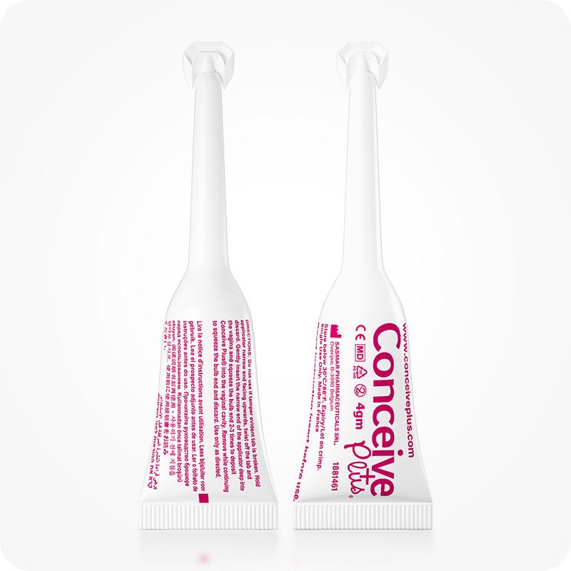 For Conceive Plus Women's Fertility Support + Applicators (FR), image showing front and back views of two individual 4g pre-filled fertility lubricant vaginal applicators, labeled in French and Dutch and medical device icons, designed for single-use fertility-friendly lubrication.